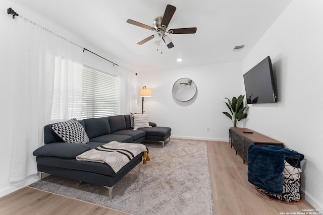 338 Tomrob Dr, San Antonio, TX 78220 - living room with wood finished floors and a ceiling fan
