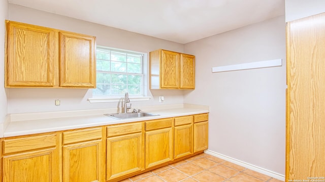 103 Weese, Pleasanton, TX 78064 - kitchen with light countertops and light tile patterned floors