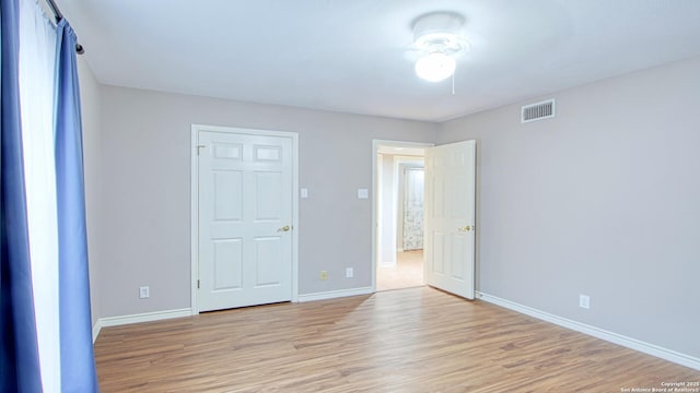 103 Weese, Pleasanton, TX 78064 - unfurnished bedroom with light wood finished floors