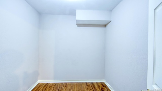 103 Weese, Pleasanton, TX 78064 - walk in closet with dark wood-style floors