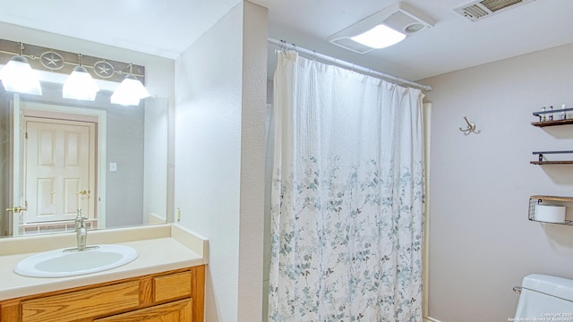 103 Weese, Pleasanton, TX 78064 - full bathroom featuring vanity and curtained shower