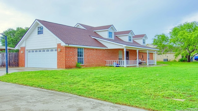 103 Weese, Pleasanton, TX 78064 - cape cod house featuring covered porch, brick siding, concrete driveway, and roof with shingles
