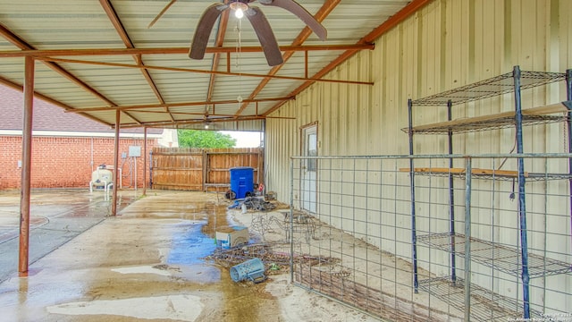 103 Weese, Pleasanton, TX 78064 - view of side of home with board and batten siding and an exterior structure