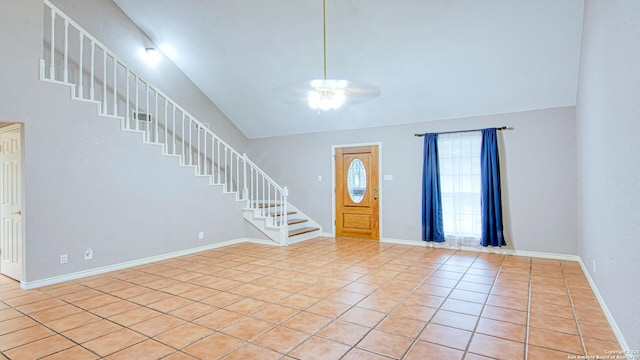 103 Weese, Pleasanton, TX 78064 - foyer with stairs, ceiling fan, light tile patterned floors, and vaulted ceiling