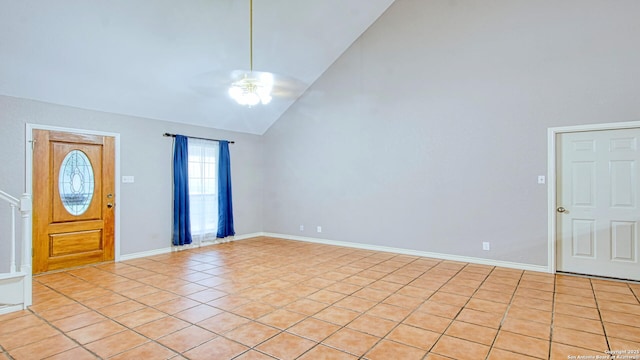 103 Weese, Pleasanton, TX 78064 - entryway featuring high vaulted ceiling, ceiling fan, and light tile patterned floors