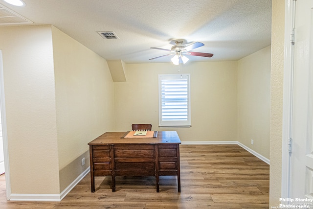 5038 Sandhill Crane, San Antonio, TX 78253 - home office featuring a ceiling fan, wood finished floors, and a textured ceiling