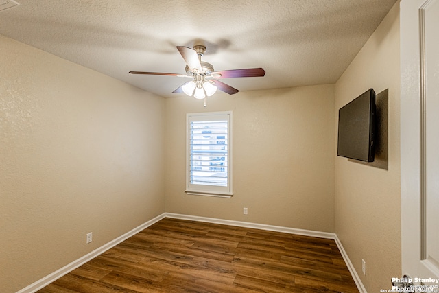 5038 Sandhill Crane, San Antonio, TX 78253 - empty room featuring dark wood-type flooring, ceiling fan, and a textured ceiling