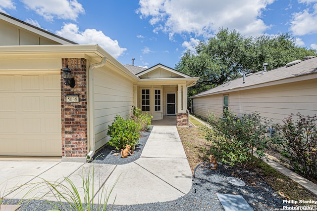 5038 Sandhill Crane, San Antonio, TX 78253 - entrance to property featuring a garage and brick siding