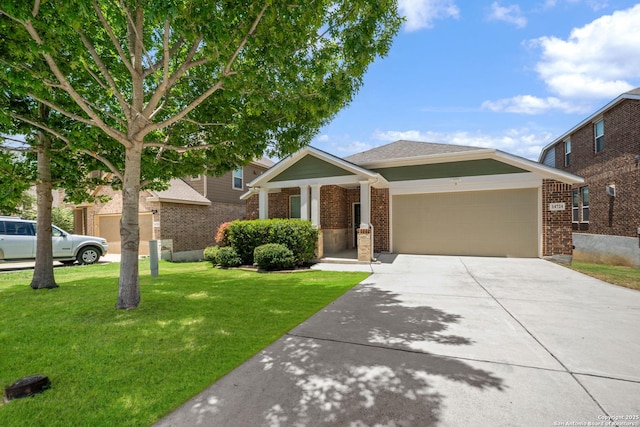 14724 Costa Leon, San Antonio, TX 78245 - view of front of property with brick siding, a garage, a front yard, and driveway