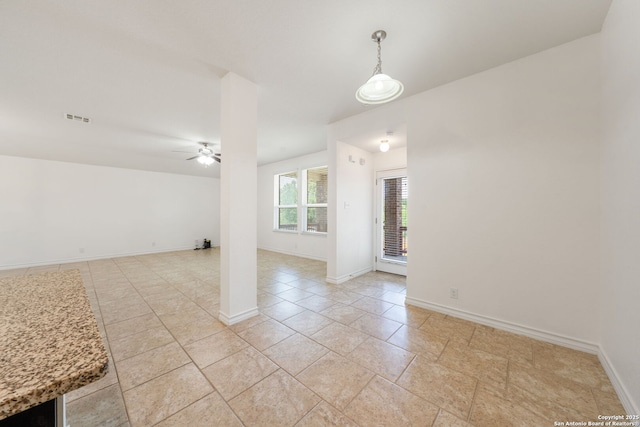 14724 Costa Leon, San Antonio, TX 78245 - empty room featuring a ceiling fan and baseboards