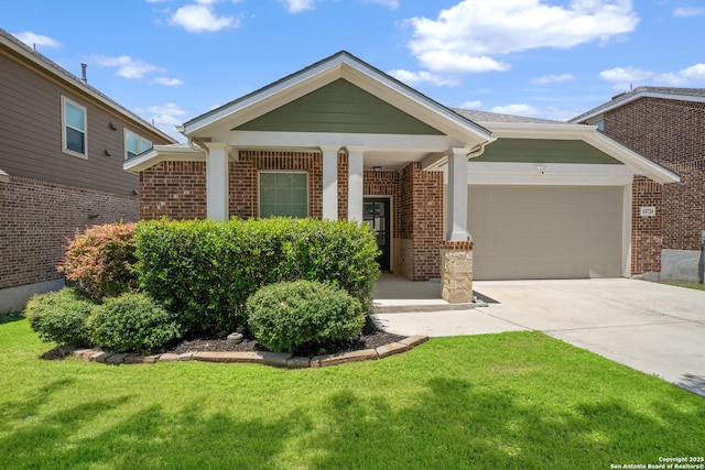 14724 Costa Leon, San Antonio, TX 78245 - view of front of home with a garage, brick siding, a front lawn, and concrete driveway