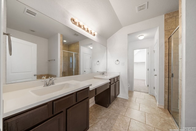 14724 Costa Leon, San Antonio, TX 78245 - bathroom featuring double vanity and a stall shower