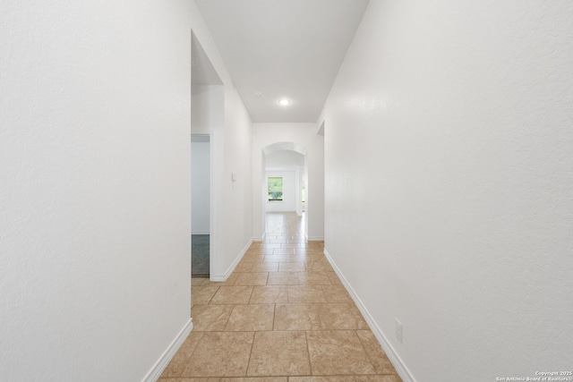 14724 Costa Leon, San Antonio, TX 78245 - hall featuring arched walkways, recessed lighting, and light stone finish flooring
