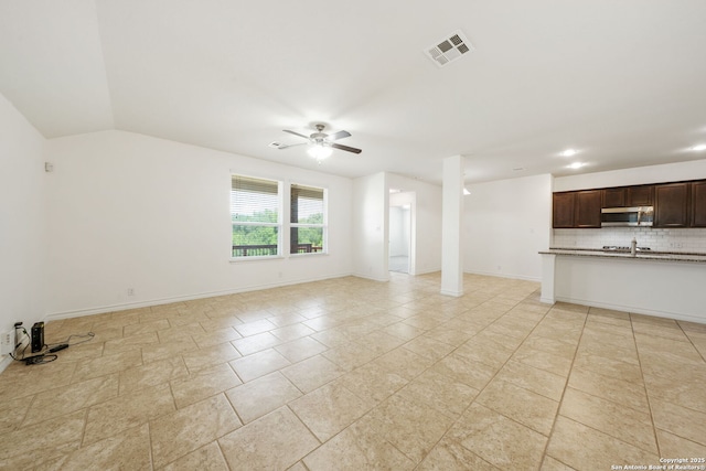 14724 Costa Leon, San Antonio, TX 78245 - unfurnished living room featuring ceiling fan and recessed lighting