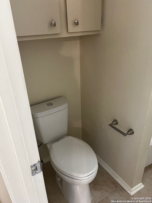 9351 Dover Rdg, San Antonio, TX 78250 - bathroom with tile patterned flooring and baseboards