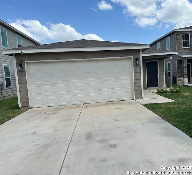 9510 Silveer Mist Way, San Antonio, TX 78254 - view of front of home featuring a garage and driveway