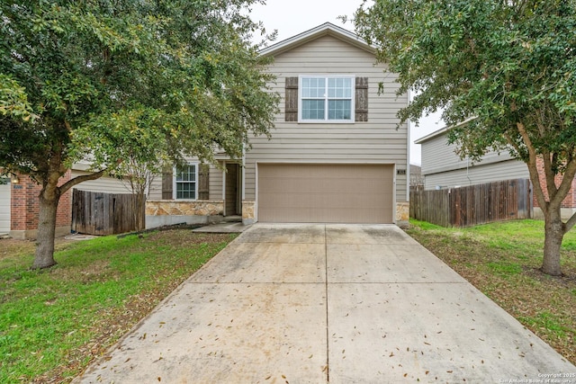 1826 Strawhouse, San Antonio, TX 78245 - view of front facade with stone siding, an attached garage, and driveway