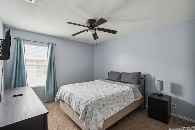 1826 Strawhouse, San Antonio, TX 78245 - bedroom featuring light carpet, ceiling fan, and a textured ceiling