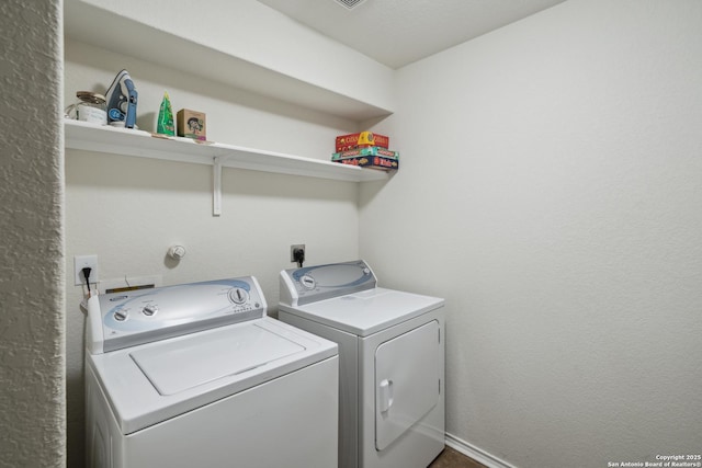 1826 Strawhouse, San Antonio, TX 78245 - laundry area featuring washing machine and clothes dryer