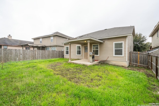 1826 Strawhouse, San Antonio, TX 78245 - rear view of property with a patio and a fenced backyard