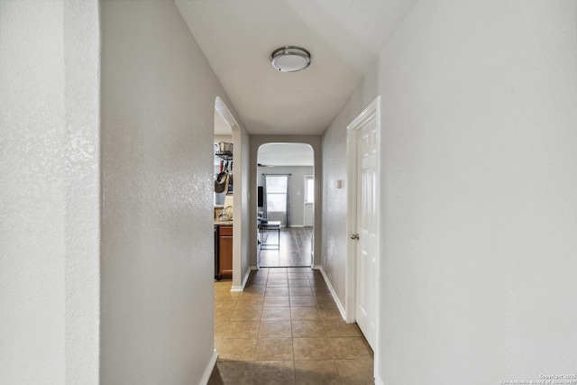 1826 Strawhouse, San Antonio, TX 78245 - corridor with arched walkways and tile patterned floors