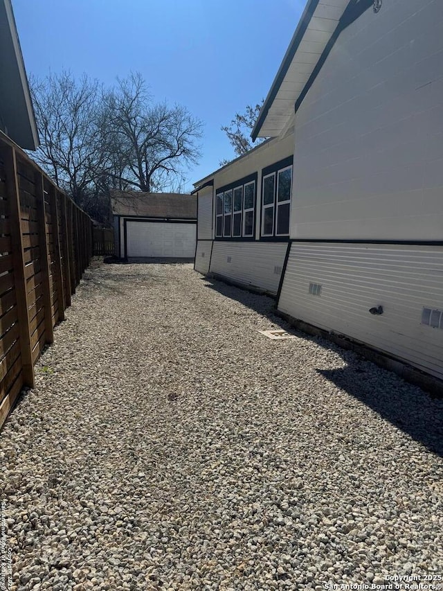 1306 Nolan, San Antonio, TX 78202 - view of yard featuring an outbuilding