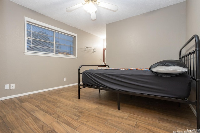 309 Meandering Way, Del Rio, TX 78840 - bedroom featuring wood finished floors and ceiling fan