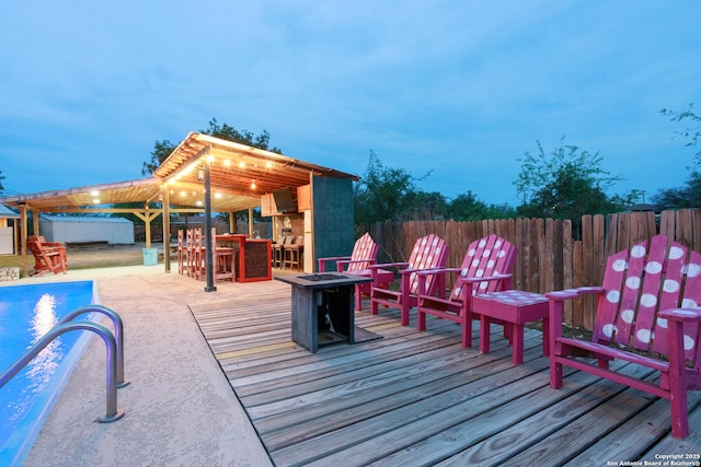 309 Meandering Way, Del Rio, TX 78840 - wooden deck with a fire pit