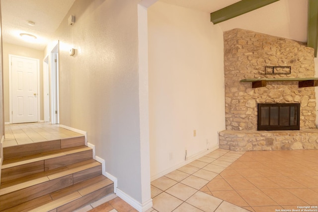 309 Meandering Way, Del Rio, TX 78840 - stairs with tile patterned flooring and a fireplace