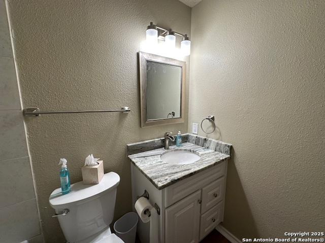 16454 Blanco Ky, San Antonio, TX 78247 - bathroom with vanity and toilet