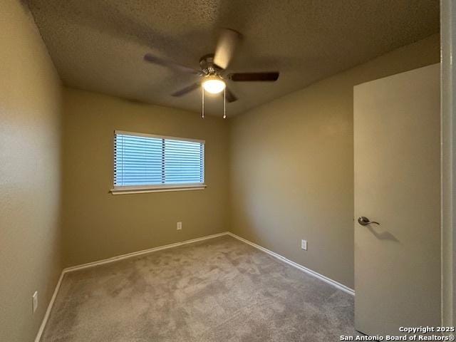 16454 Blanco Ky, San Antonio, TX 78247 - empty room with ceiling fan, a textured ceiling, and carpet floors