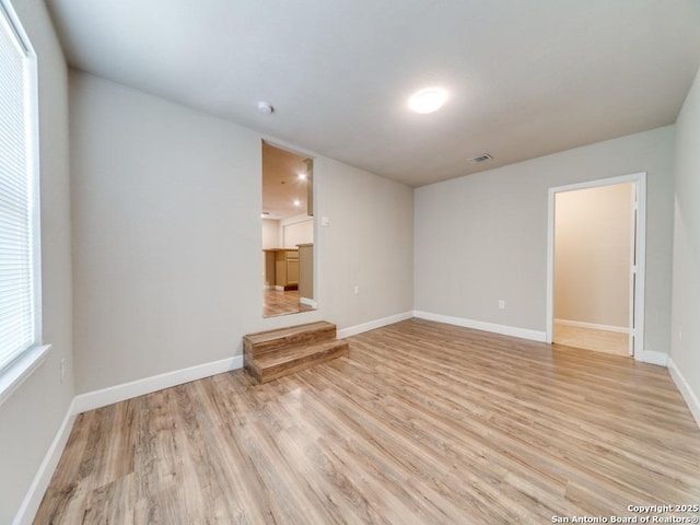 122 Adrian, San Antonio, TX 78213 - spare room with light wood-type flooring and baseboards