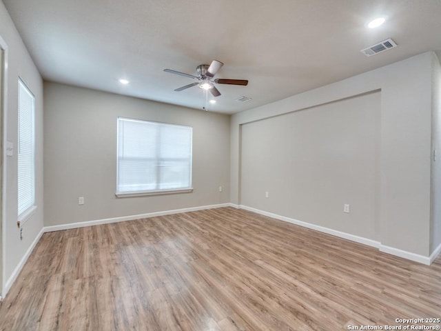 122 Adrian, San Antonio, TX 78213 - empty room featuring a ceiling fan, healthy amount of natural light, light wood-style flooring, and recessed lighting