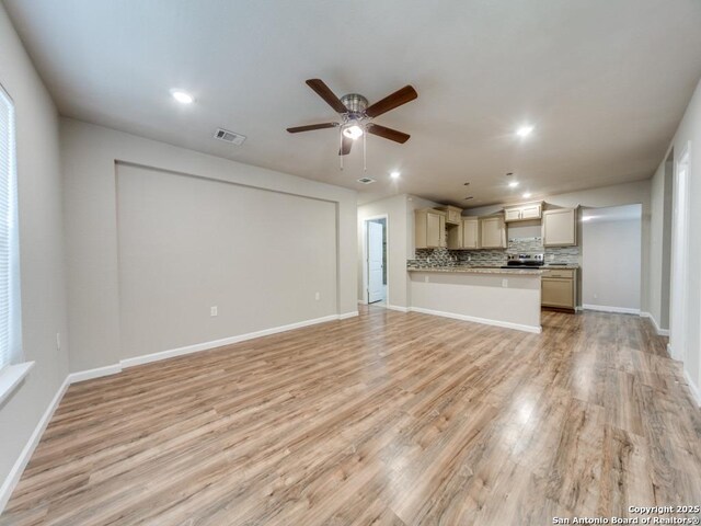 122 Adrian, San Antonio, TX 78213 - unfurnished living room with light wood-style flooring, ceiling fan, and recessed lighting