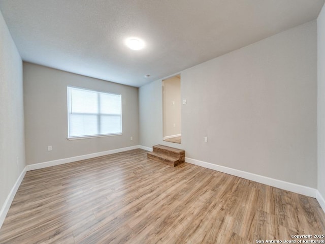 122 Adrian, San Antonio, TX 78213 - unfurnished room with light wood-style floors