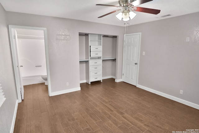 7730 Pipers Vw, San Antonio, TX 78251 - unfurnished bedroom with dark wood-style floors, a closet, ensuite bathroom, and a ceiling fan