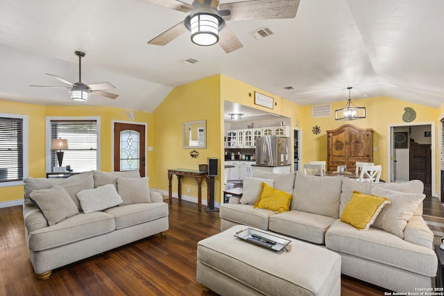 177 Lakeview Cir, La Vernia, TX 78121 - living room with lofted ceiling, ceiling fan, dark wood-style flooring, and a chandelier