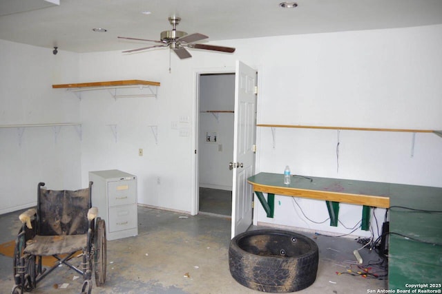 909 San Antonio, Pleasanton, TX 78064 - misc room featuring concrete flooring and a ceiling fan