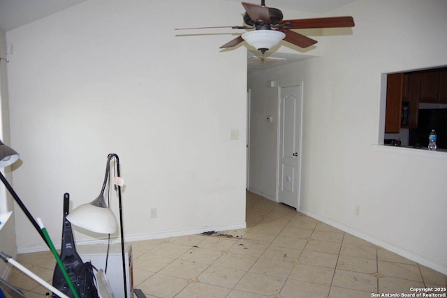 909 San Antonio, Pleasanton, TX 78064 - exercise room featuring a ceiling fan and baseboards
