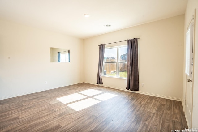 7335 Sharma Vly, San Antonio, TX 78252 - empty room with wood finished floors