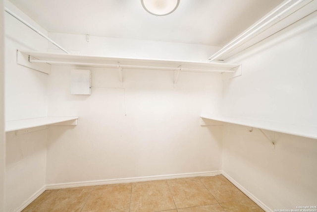 6914 Ludgate, San Antonio, TX 78239 - walk in closet with light tile patterned floors