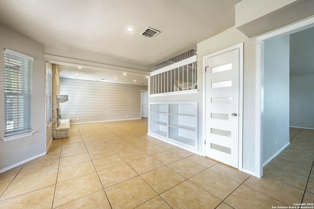 6914 Ludgate, San Antonio, TX 78239 - spare room with built in features, light tile patterned flooring, and recessed lighting