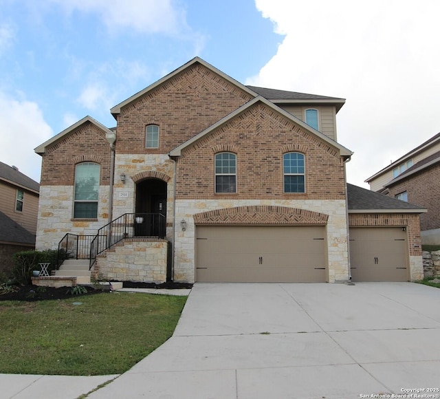 2514 Ladera Bnd, San Antonio, TX 78261 - view of front of property with concrete driveway, stone siding, a front lawn, and brick siding