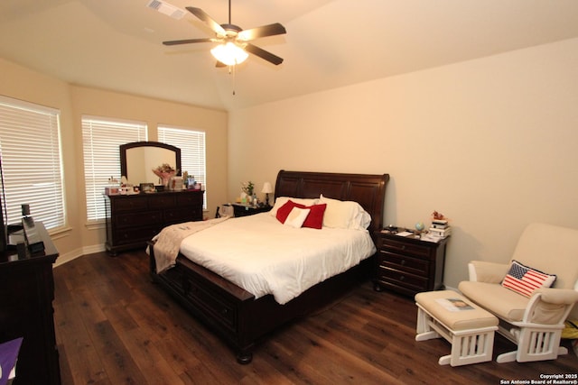 2514 Ladera Bnd, San Antonio, TX 78261 - bedroom with dark wood-style flooring, vaulted ceiling, and a ceiling fan