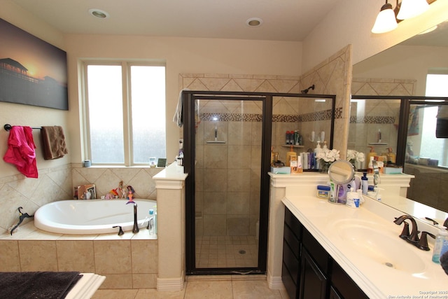 2514 Ladera Bnd, San Antonio, TX 78261 - full bathroom with a bath, vanity, healthy amount of natural light, and a stall shower