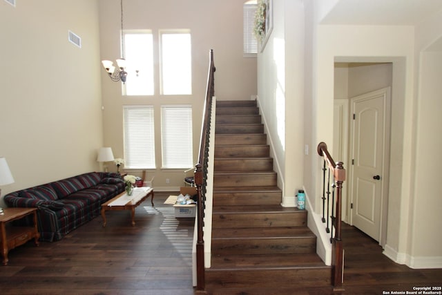 2514 Ladera Bnd, San Antonio, TX 78261 - stairway with a chandelier, plenty of natural light, and wood finished floors