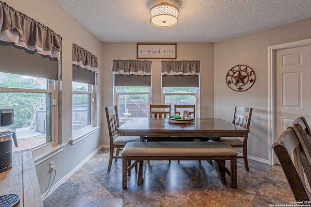 7907 Donshire, Converse, TX 78109 - dining space with a textured ceiling and stone finish flooring
