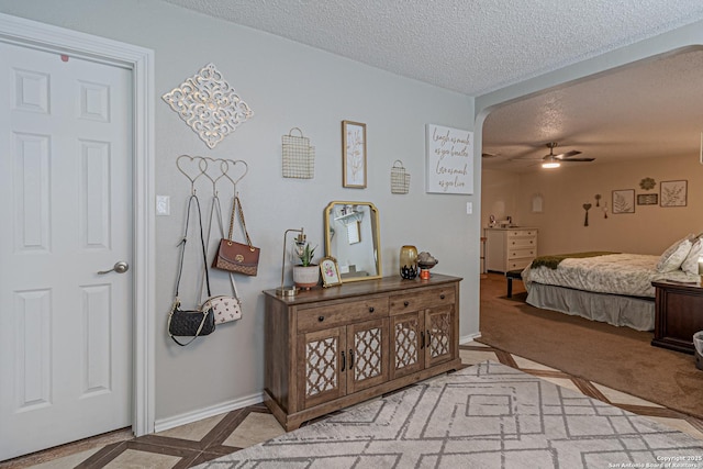7907 Donshire, Converse, TX 78109 - bedroom featuring a textured ceiling and arched walkways