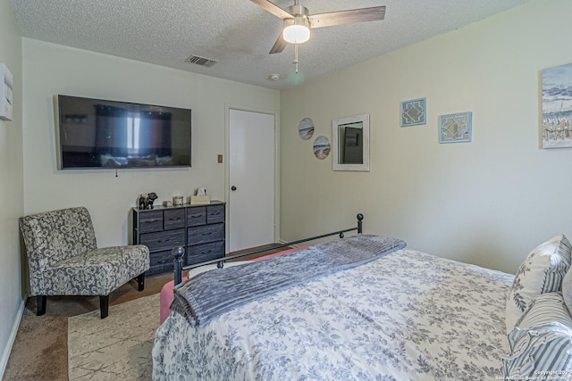 7907 Donshire, Converse, TX 78109 - carpeted bedroom featuring a textured ceiling and ceiling fan
