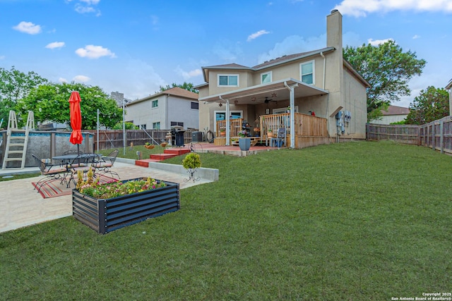 7907 Donshire, Converse, TX 78109 - rear view of property featuring a ceiling fan, a fenced backyard, a patio, a chimney, and stucco siding
